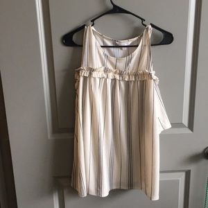 Cold shoulder short sleeve shirt.